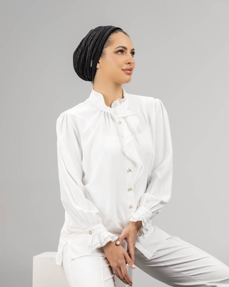 Sleek black cotton turban for women, featuring a minimalist design and a soft, breathable fabric perfect for any season.