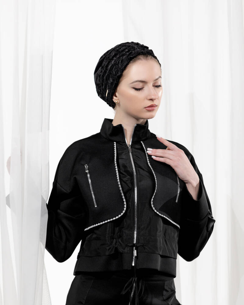 Sophisticated velvet black turban with intricate embroidery details, offering a luxurious and elegant look for women.